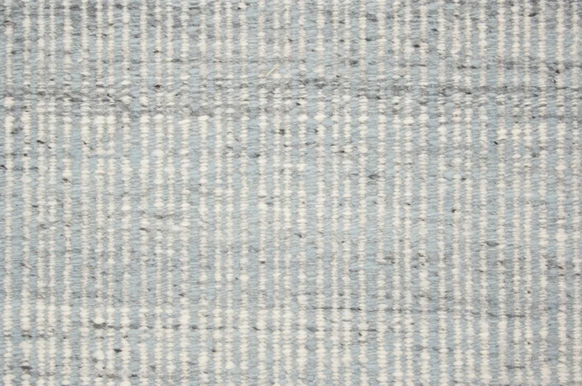 Broadloom carpet swatch in a stripe pattern in a blue design