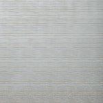Detail of wallpaper in a wavy stripe print in metallic gray.