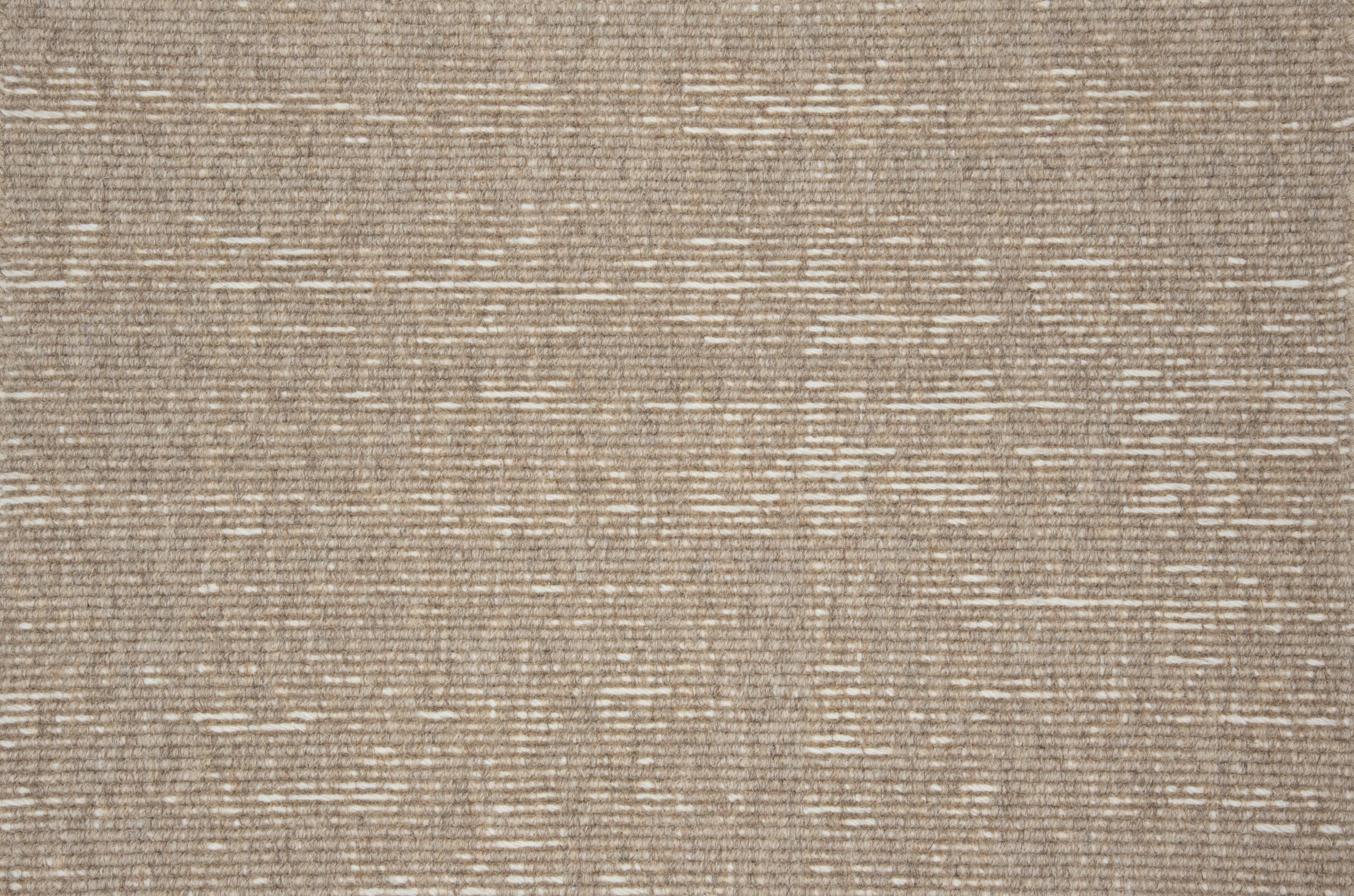 Broadloom carpet with ribbed stripe in taupe.