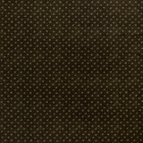 printed linen fabric in a clustered dot pattern in cream on a dark brown field.