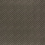 printed linen fabric in a clustered dot pattern in beige on a dark gray field.