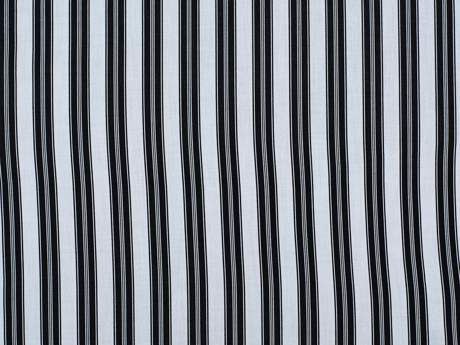 Striped performance fabric in black on white.
