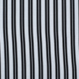 Striped performance fabric in black on white.