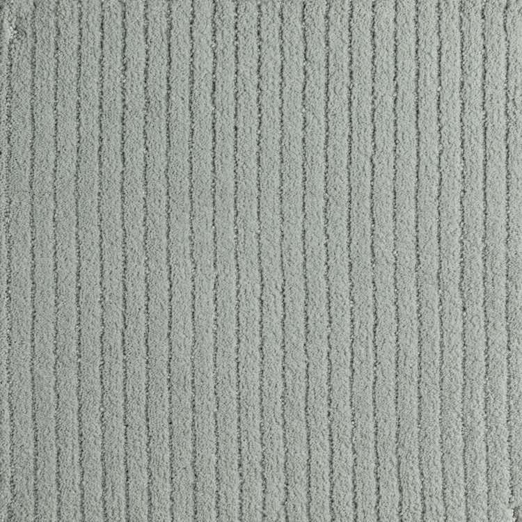 Broadloom carpet in greenish grey, with a textural stripe.