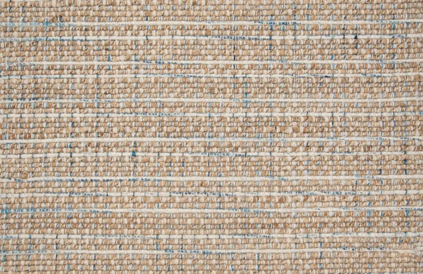 Broadloom carpet swatch in a textured pattern in a blue tan design