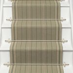 Striped flatweave runner in sage on white staircase 