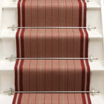 Striped flatweave runner in red on white staircase
