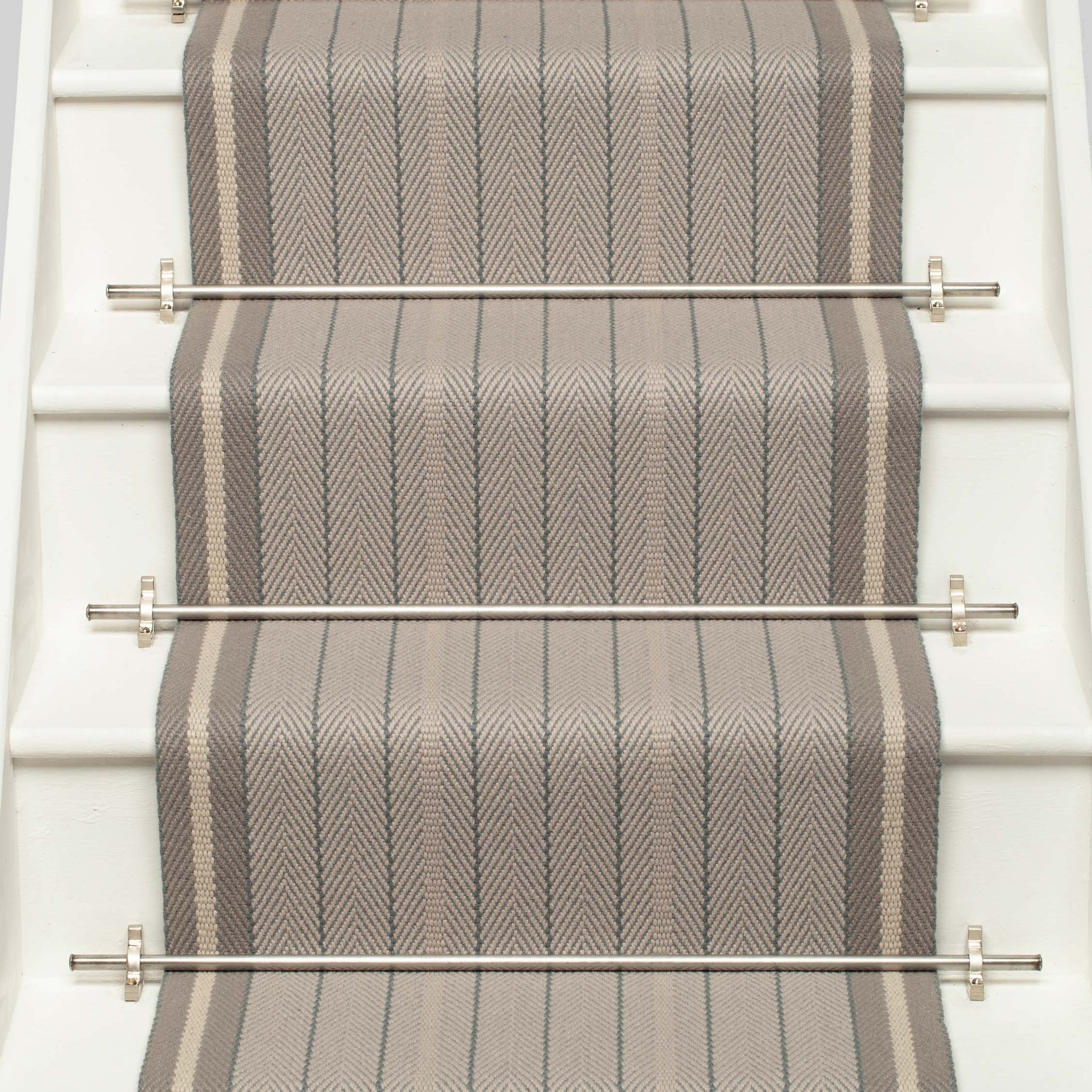 Striped flatweave runner in grey on white staircase