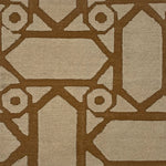 Close-up of a brown geometric pattern on a beige background