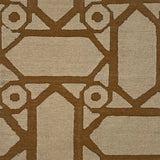 Close-up of a brown geometric pattern on a beige background