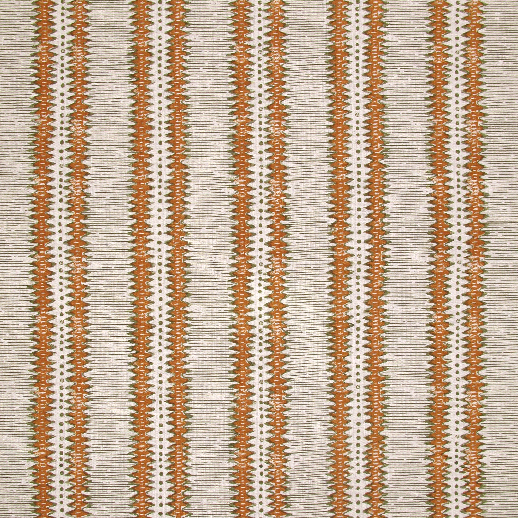 Detail of fabric in a dense tribal stripe pattern in shades of cream, orange and olive green. 