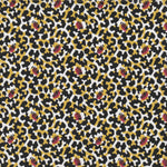 Detail of fabric in a playful irregular botanical print in red, yellow and black on a white field.