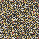 Detail of fabric in a playful irregular botanical print in red, yellow and black on a white field.