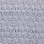 Navy blue fabric with a white floral pattern
