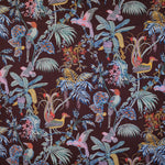 Detail of fabric in a dense leaf and bird print in a rainbow of shades on a dark brown field.