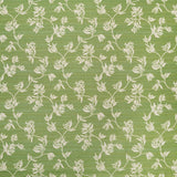 Performance fabric with a scrolling floral design in green. 