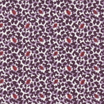 Detail of fabric in a playful irregular botanical print in red and purple on a white field.