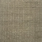Handwoven rug in a grey and cream chevron pattern.