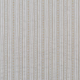 Dimensional embroidered fabric in an irregular stripe pattern in shades of gray, white and cream.
