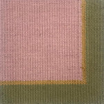 Close up of a flatweave rug in light purple with tan and green border. 
