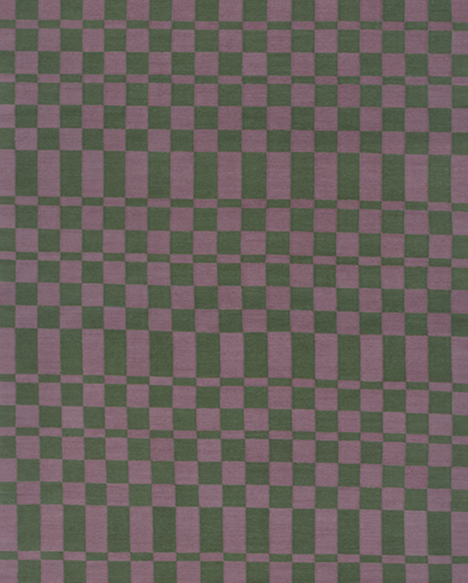 Detail of dhurrie rug in a checkerboard pattern of green and purple