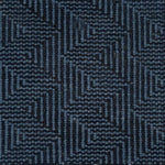 Patterned carpet with a zigzag design in black and blue.