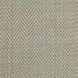 Close up of a rug in a woven herringbone pattern in light green.
