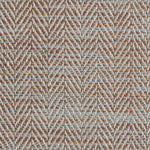 Close up of a rug in a woven herringbone pattern in blue and brown. 