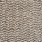 Close up of a rug in a woven herringbone pattern in taupe.