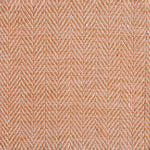 Close up of a rug in a woven herringbone pattern in orange.