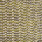 Close up of a rug in a woven herringbone pattern in bright green.