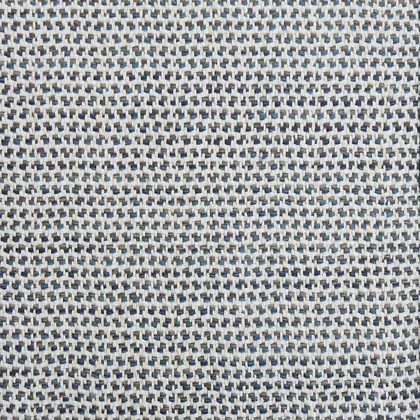 A handwoven rug with a herringbone weave in white with striated yarns of dark grey and marine blue.