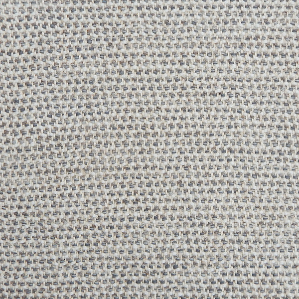 A handwoven rug with a herringbone weave in white with striated yarns in shades of grey.