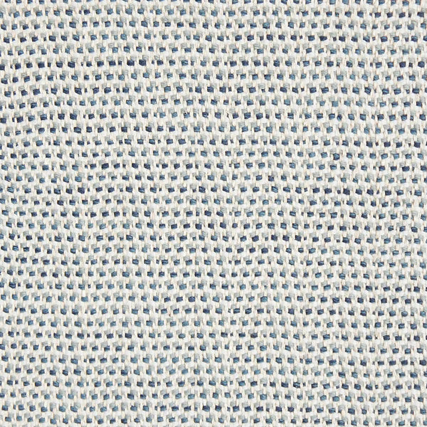 A handwoven rug with a herringbone weave in white with striated yarns of grey and blue.