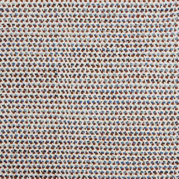 A handwoven rug with a herringbone weave in white with striated yarns of blue cream and brown.
