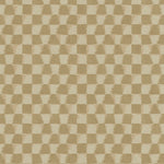 Detail of printed wallpaper in a watercolor ikat-inspired checkerboard pattern in tonal shades of warm tan.