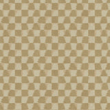 Detail of printed wallpaper in a watercolor ikat-inspired checkerboard pattern in tonal shades of warm tan.