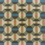 Handmade flatweave rug with complex geometric design in green, charcoal grey, blue, lime green, cream and coral pink.