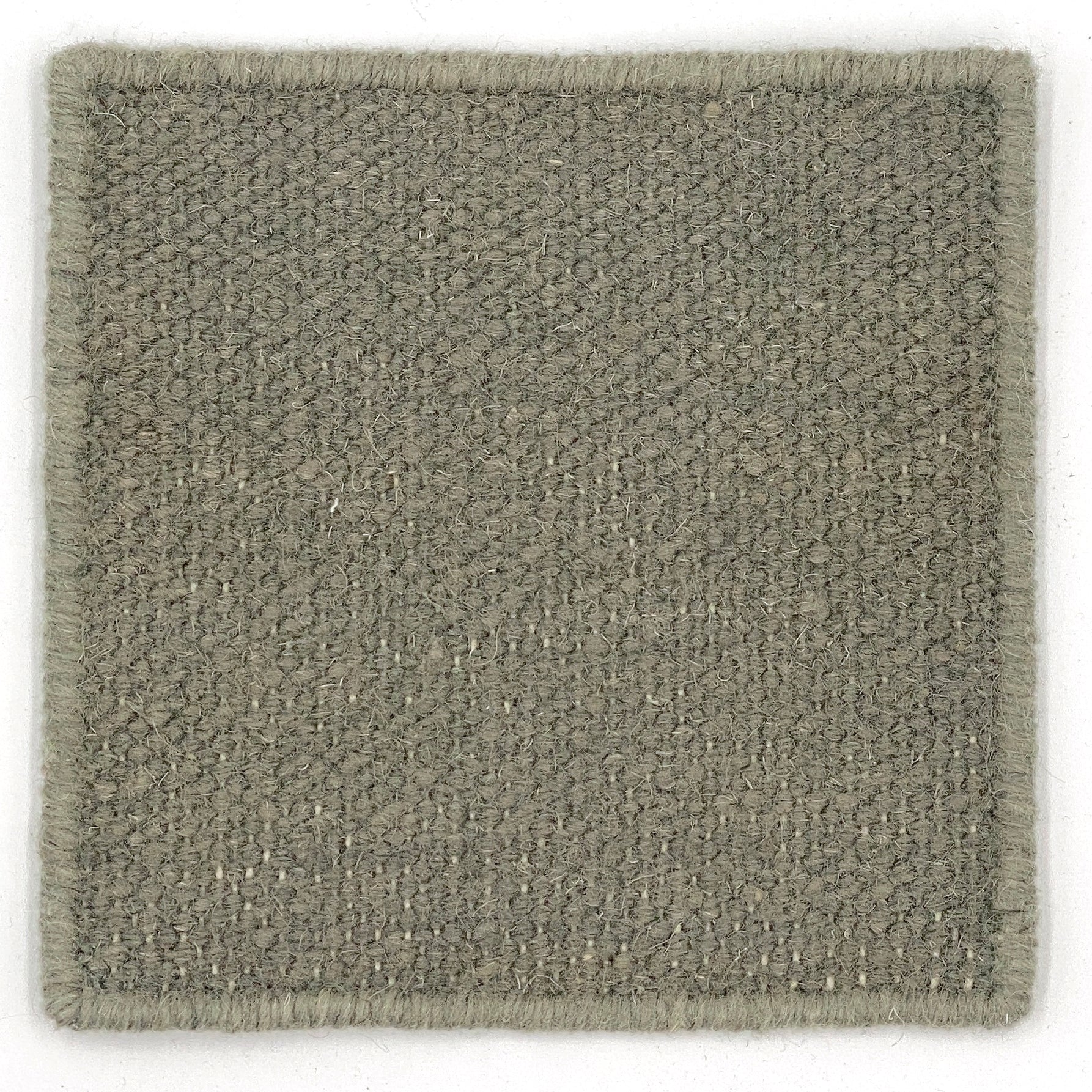 Flatweave dhurrie sample in steel grey. 
