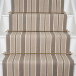 Striped flatweave runner in cream and brown on white staircase