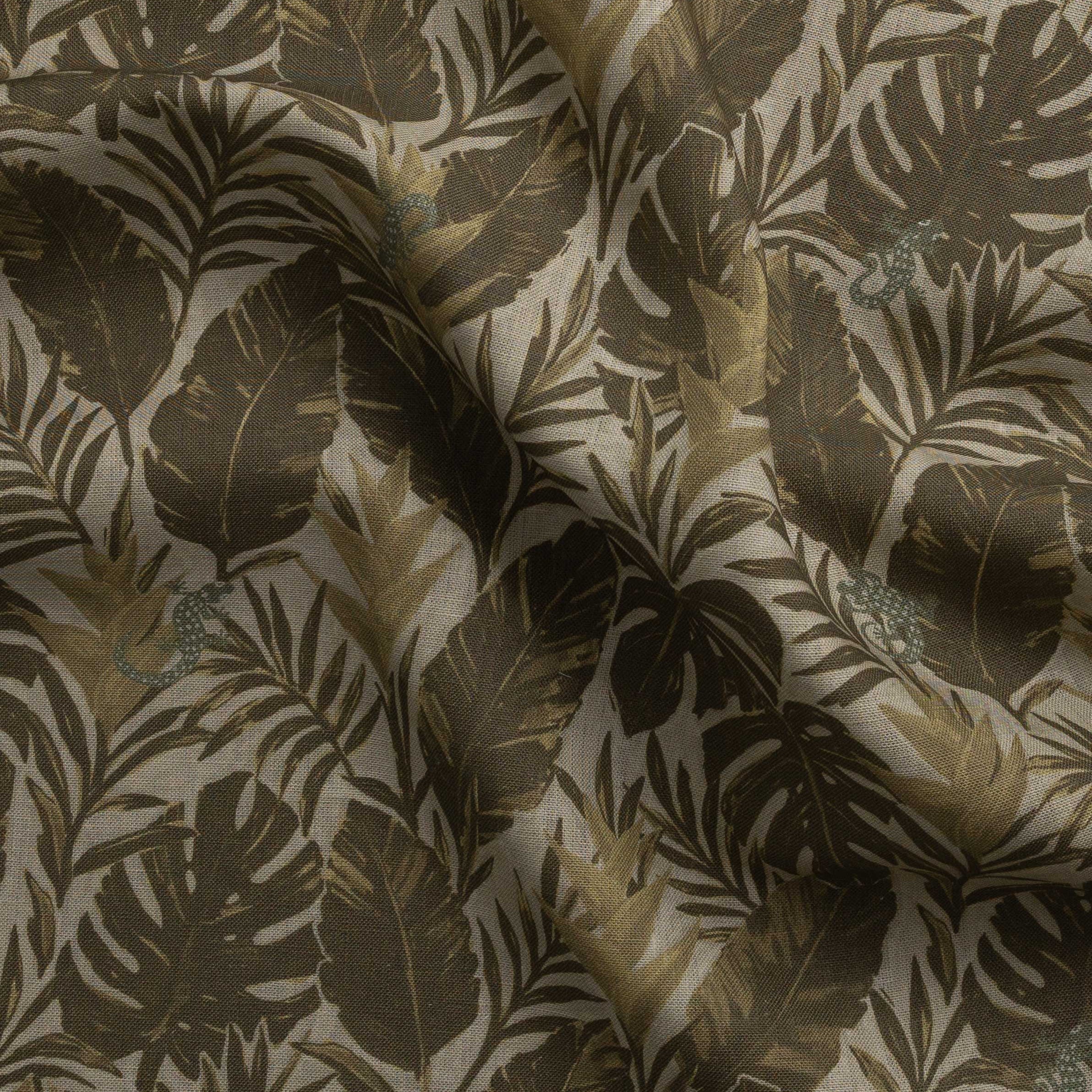 Detail of gently draped printed fabric in a tropical palm frond pattern in muted brown  scattered with small grey-green lizards. 