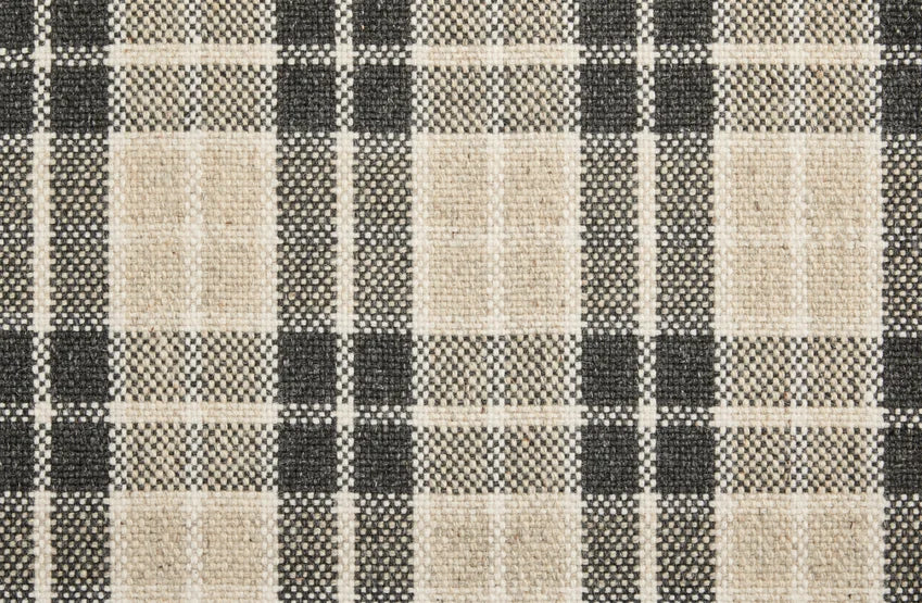 Broadloom carpet swatch in a checkered pattern in a black white design