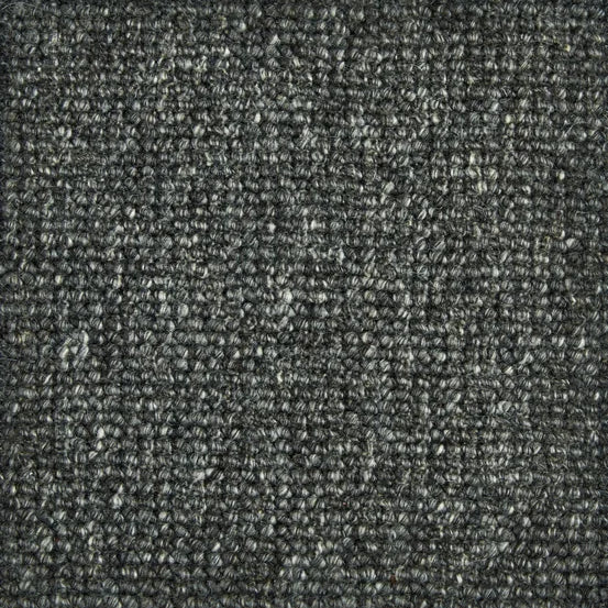 Broadloom carpet swatch in a textured pattern in a dark grey design