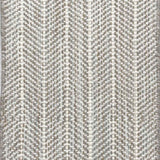 Close up of broadloom carpet with striated herringbone weave in white with accents of grey and taupe.
