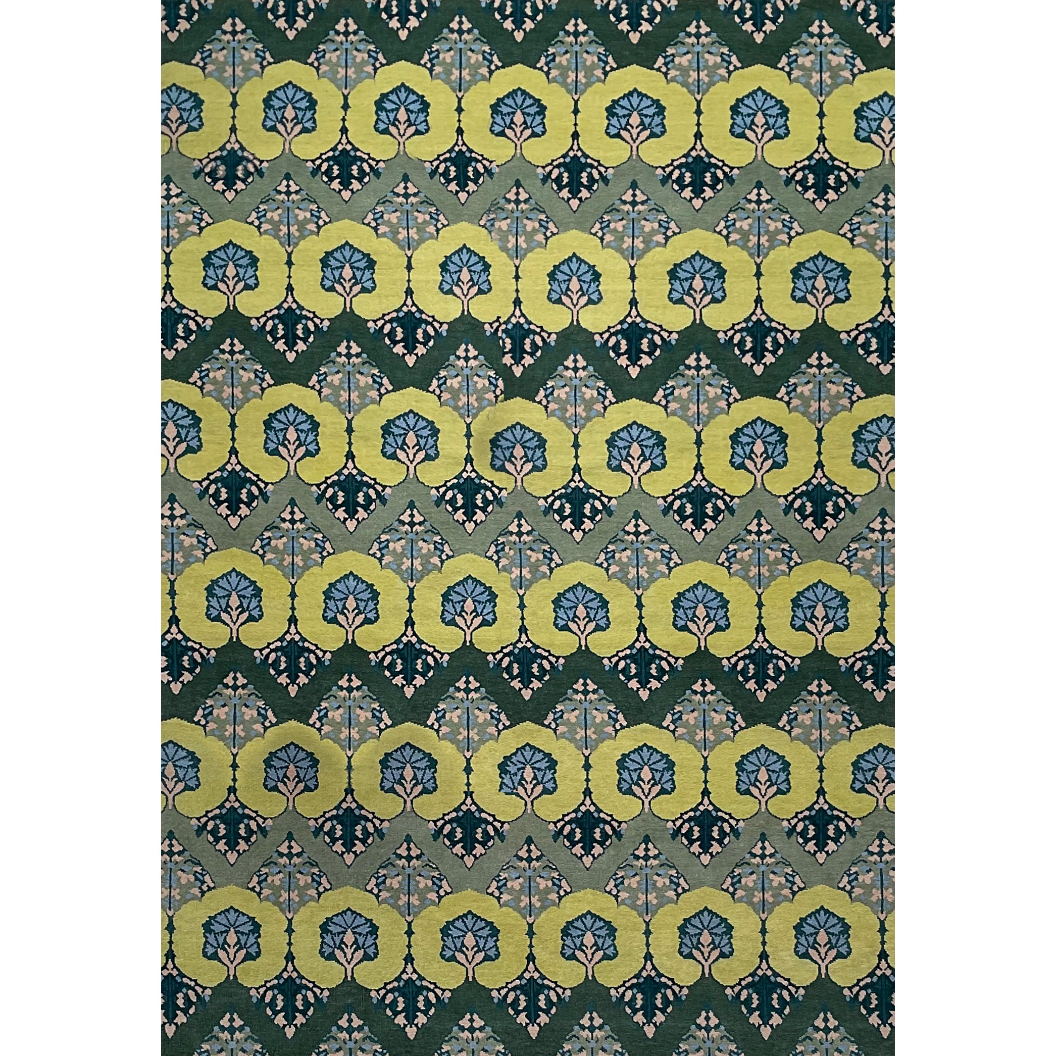 Patterned rug with green and blue botanical design on a white background