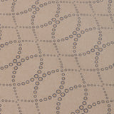 Detail of a wallpaper in a playful floral lattice print in tan and navy on a taupe field.