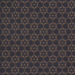 Wallpaper in a floral lattice print in  kraft brown on a navy field