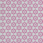 Wallpaper in a floral lattice print in magenta on a cream field.