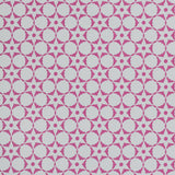 Wallpaper in a floral lattice print in magenta on a cream field.