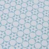 Wallpaper detail in a floral lattice print in powder blue on a cream field